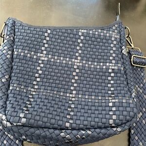 Haute Shore Neoprene Stylish Navy Blue Woven Women's Bag